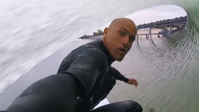 Kelly Slater surfs his man-made wave pool.