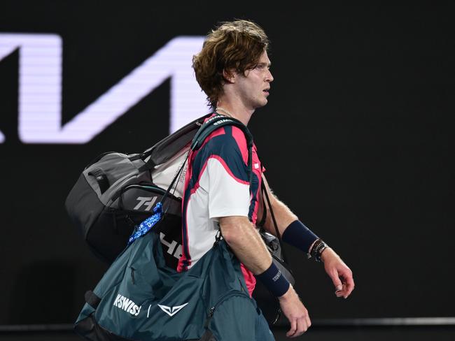 MELBOURNE, AUSTRALIA - JANUARY 14: Andrey Rublev leaves Margaret Court Arena following defeat against Joao Fonseca of Brazil in the Men's Singles First Round match during day three of the 2025 Australian Open at Melbourne Park on January 14, 2025 in Melbourne, Australia. (Photo by Hannah Peters/Getty Images)