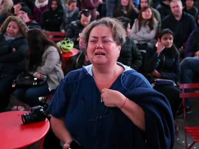 A woman reacts as Donald Trump wins Georgia in the presidental election outside Times Square on November 8, 2016 in New York City. Trump was leading the delegate count and popular vote late election night. Michael Reaves/Getty Images/AFP == FOR NEWSPAPERS, INTERNET, TELCOS & TELEVISION USE ONLY ==