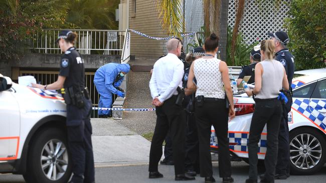 A forensic investigator combs the area. Picture, John Gass