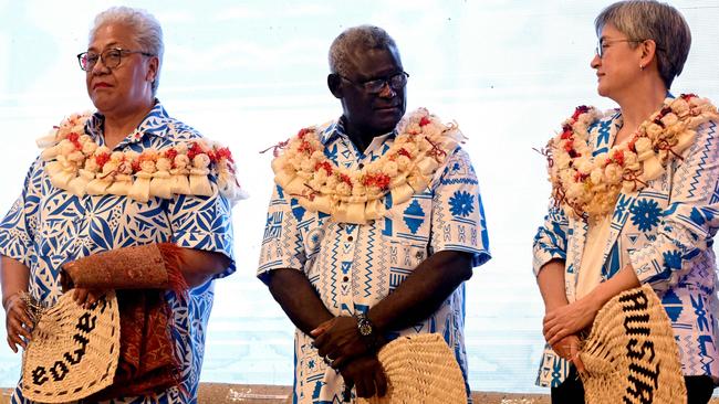 Australia's Foreign Minister Penny Wong (R) and Solomon Islands Prime Minister Manasseh Sogavare (C) chat as Samoa Prime Minister Fiam? Naomi Mata?afa (L) in Suva in 2022. Picture: William WEST / AFP