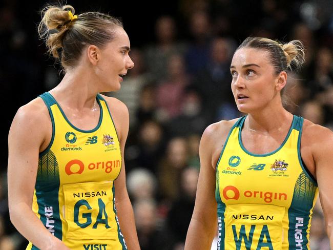 INVERCARGILL, NEW ZEALAND - OCTOBER 19: Kiera Austin and Liz Watson of Australia talk during game three of the Constellation Cup series between New Zealand Silver Ferns and Australia Diamonds at ILT Stadium Southland on October 19, 2023 in Invercargill, New Zealand. (Photo by Joe Allison/Getty Images)