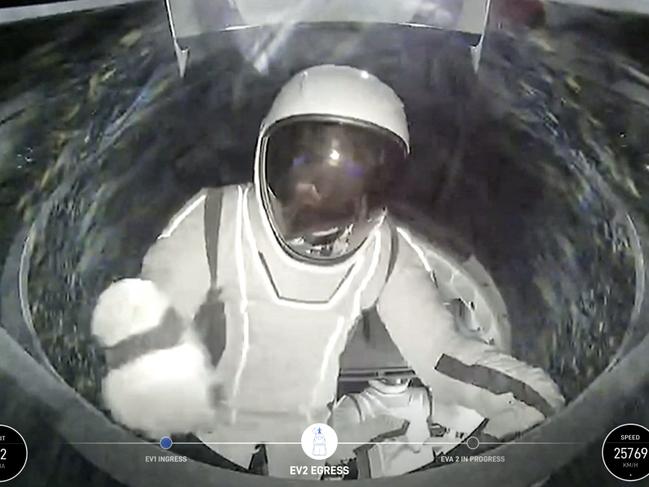 This handout picture courtesy of SpaceX and Polaris taken on September 12, 2024, shows US SpaceX engineer Sarah Gillis, egressing the Dragon spacecraft, during the first private spacewalk performed by the crew of the SpaceX Polaris Dawn mission. After trekking deeper into space than any humans in the last half-century, a pioneering private crew is set to make history September 12, 2024, with the first-ever spacewalk by non-professional astronauts. The SpaceX Polaris Dawn mission, led by fintech billionaire Jared Isaacman, launched early Tuesday from the Kennedy Space Center in Florida, reaching a peak altitude of 870 miles (1,400 kilometers). (Photo by Polaris Program / AFP) / RESTRICTED TO EDITORIAL USE - MANDATORY CREDIT "AFP PHOTO / SpaceX / Polaris" - NO MARKETING NO ADVERTISING CAMPAIGNS - DISTRIBUTED AS A SERVICE TO CLIENTS