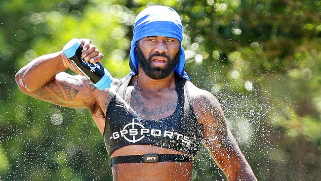 Parramatta Eels player Semi Radradra cools off doing a time trial run from Soldiers Beach to Norah Head Lighthouse and back, during a training camp on the NSW Central Coast. Picture: Troy Snook.