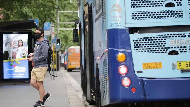 Masks will still be required on public transport. Picture: NCA NewsWire / Christian Gilles