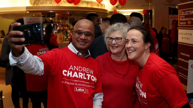 Labor volunteers capture the special moment. Picture: Damian Shaw