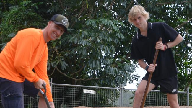 Clayton Farmer of Trinity Skateparks with Yorkeys Knob resident Ross Willis, 17, who campaigned for six years to get a skate park at the northern beaches suburb – and work on the project began on August 9. Picture: Bronwyn Farr.