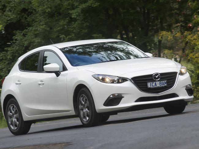 Neck and neck ... The battle between the Mazda3 and Toyota Corolla is tighter than Holden versus Ford. Picture: Jack Atley