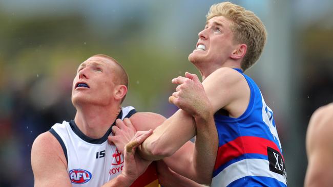 Bulldog Tim English battles with Adelaide's Sam Jacobs in what will be his last game for the Crows. Picture: Michael Klein