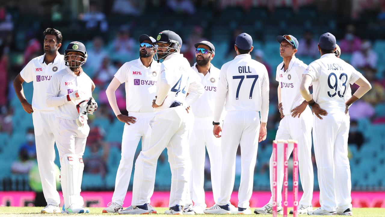 The India team watches the replay screen after unsuccessfully calling for the DRS challenge. (Photo by Mark Kolbe/Getty Images)