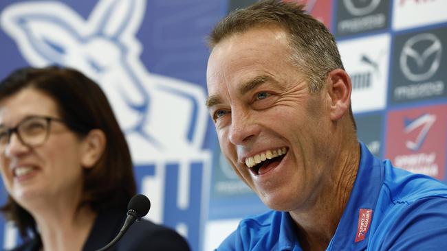 Alastair Clarkson shares a laugh with Sonja Hood at his first press conference as North Melbourne coach.