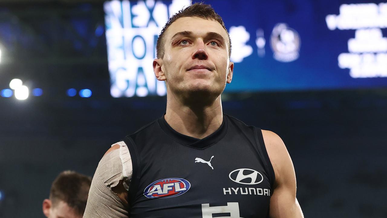 MELBOURNE. 13/05/2023. AFL. Round 9. Carlton vs Western Bulldogs at Marvel Stadium. Patrick Cripps leads the Blues off Marvel Stadium . Pic: Michael Klein