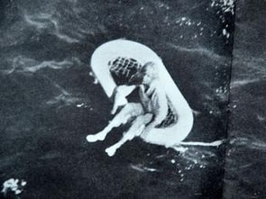 Sole survivor Terry Jo Duperrault, 11, badly sunburnt, dehydrated and surrounded by curious sharks on a life raft in the Bahamas in 1961 after the massacre.