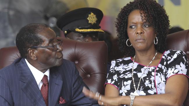 FILE - In this Saturday Feb. 27, 2016 file photo, Zimbabwe President Robert Mugabe and his wife Grace attend his birthday celebrations in Masvingo. (AP Photo/Tsvangirayi Mukwazhi, File)