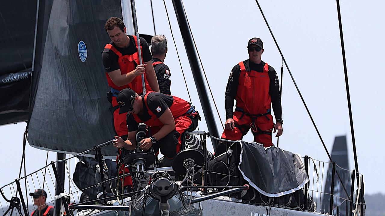 Photo taken on December 26, 2019 shows Hong Kong Dovell 100 yacht SHK Scallywag sailing out of Sydney harbour at the start of the Sydney to Hobart yacht race. (Photo by GLENN NICHOLLS / AFP) / -- IMAGE RESTRICTED TO EDITORIAL USE - STRICTLY NO COMMERCIAL USE --