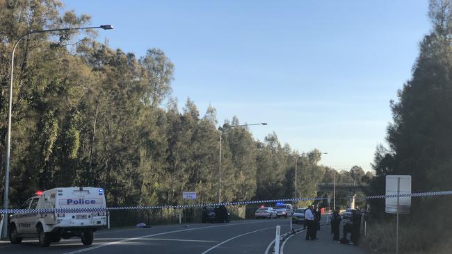 Police at the scene of the shooting in July last year. Photo: Britt Ramsey