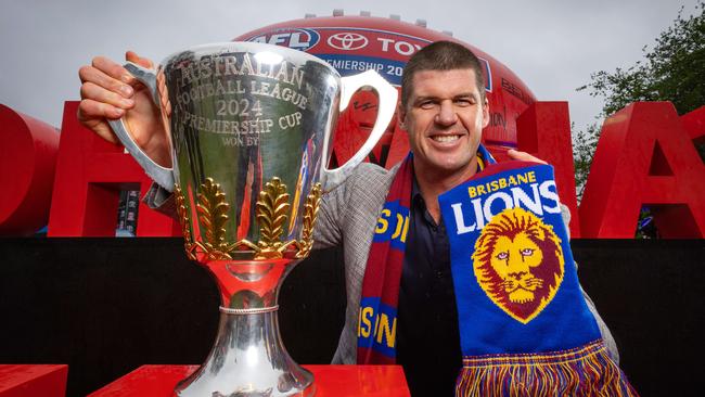 Brisbane legend and Toyota Ambassador Jonathan Brown with the 2024 AFL Premiership Cup at Toyota’s live site. Picture: Mark Stewart