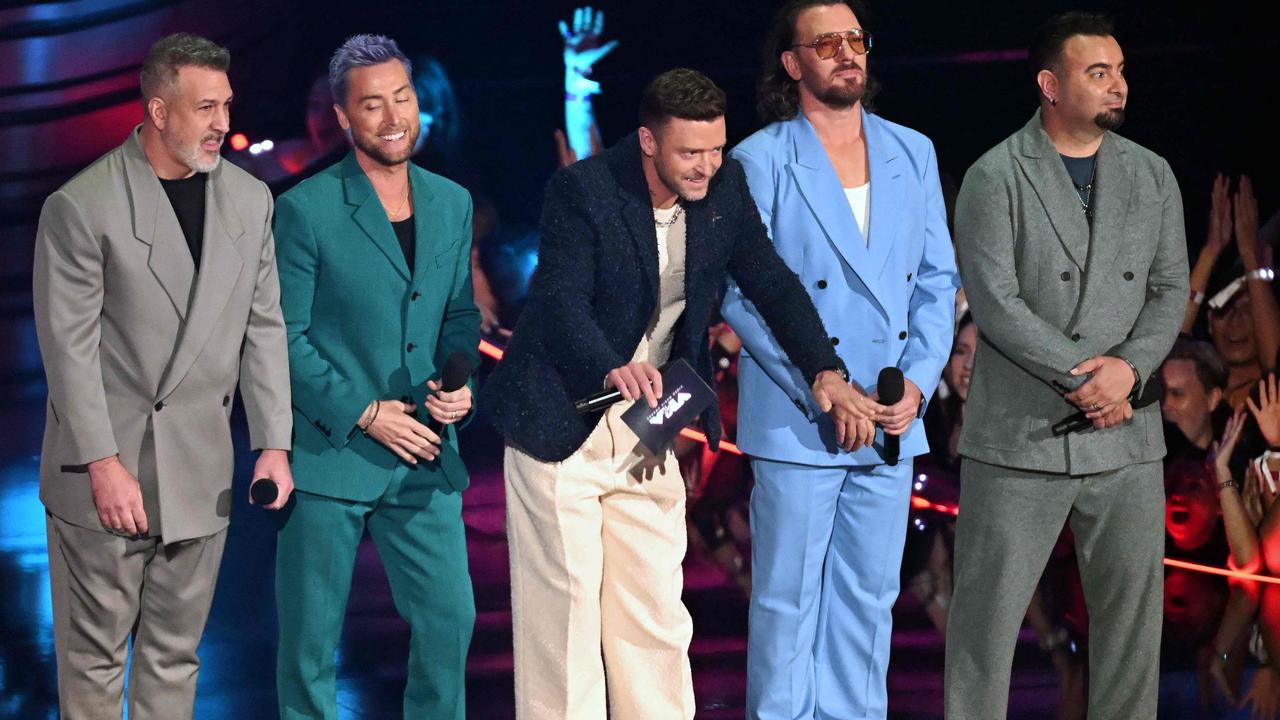 NSYNC is in the building! Picture: Timothy A. CLARY / AFP