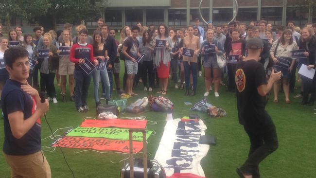 Students gather for a demonstration on the lawns of UNSW after footage of college boys chanting sexist and vulgar songs was leaked.