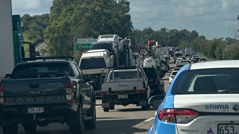 Gold Coast traffic: Emergency services called to motorbike and car crash on the M1 in Arundel. Photo: Ashleigh Jansen