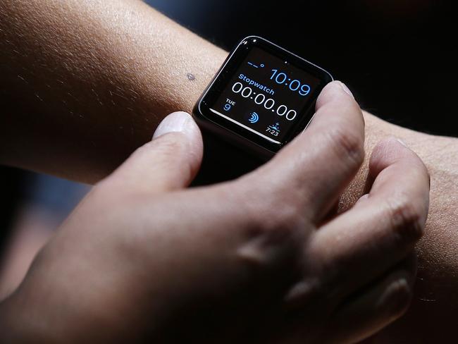 Connected ... the Apple Watch will pair with an iPhone 5 or higher. Picture: Justin Sullivan/Getty Images/AFP