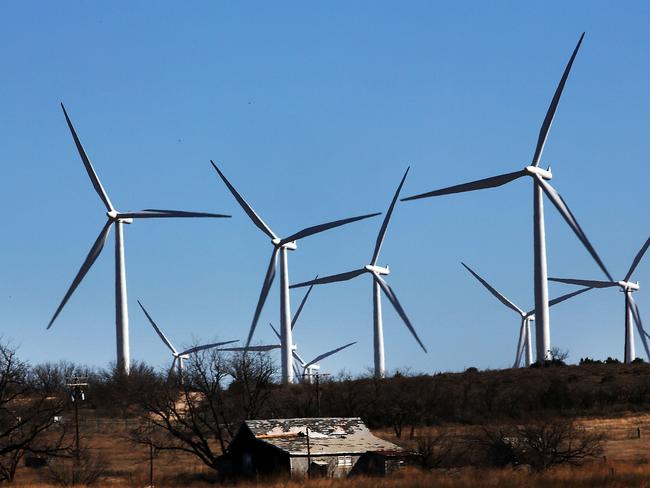 (FILES) In this file photo taken on January 21, 2016, wind turbines at a wind farm in Colorado City, Texas. Wind power accounted for 8.3 percent of the electricity generated in Texas during 2013. - The US Federal Reserve's favored measure of inflation stayed right on target last month, another sign that for now price pressures remain tame, according to government data released on November 29, 2018. The Commerce Department report also showed Americans dipped into their savings to fund a spending spree in October, with biggest outlays going to pay for prescription drugs and household utilities like electricity and gas (Photo by SPENCER PLATT / GETTY IMAGES NORTH AMERICA / AFP)