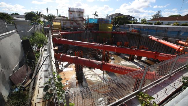 Chevron Island residents are worried about a 14 story development literally at their back door, with sinkholes and building waste being thrown in their garden. Picture Glenn Hampson