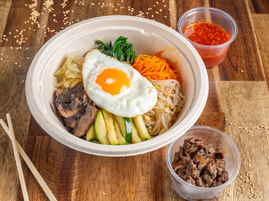 Bibimbap features six different vegetables, special gochujang sauce, a sunny-side-up fried egg, with the option for beef bulgogi or spicy pork jeyuk. Picture: Supplied.