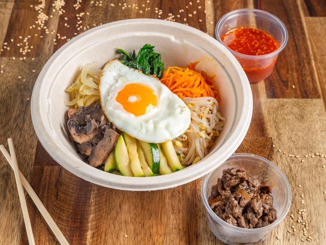 Bibimbap features six different vegetables, special gochujang sauce, a sunny-side-up fried egg, with the option for beef bulgogi or spicy pork jeyuk. Picture: Supplied.