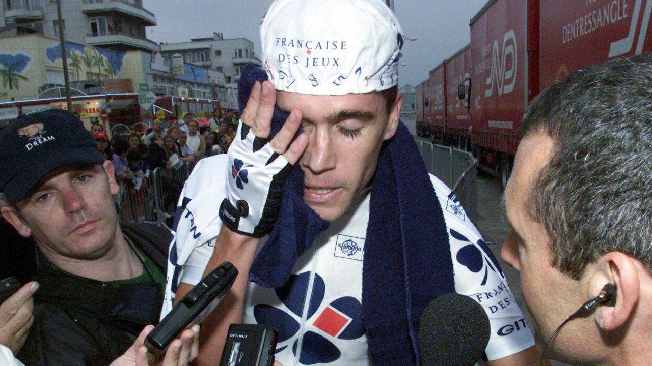 Cycling - Aust cyclist Bradley (Brad) McGee showing strain after competing in prologue time-trial stage race in Tour de France 07 Jul 2001.