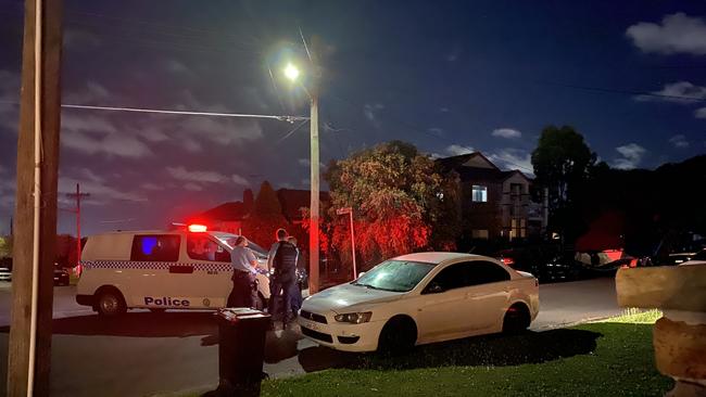 Part of Wesley St in Greenacre remained closed late into the evening on Monday, with up to half a dozen police officers attending the scene on the usually quiet residential street. Picture: Alyce Mokrzycki