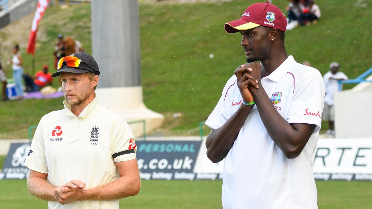 Joe Root and West Indies skipper Jason Holder, who will miss the last Test through suspension. 