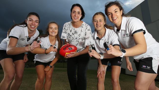 Victorian female footy umpires hoping to become AFL umpires. From the left: Bronte Annand, Genevieve Devenish, AFLW boss Nicole Livingstone, Courtney Gibson and Annie Mirabile. Picture: Michael Klein