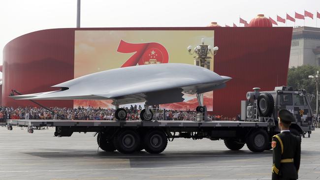 A Chinese military truck carries an aerial vehicle during a parade to commemorate the 70th anniversary of the founding of Communist China in Beijing. Picture: AP