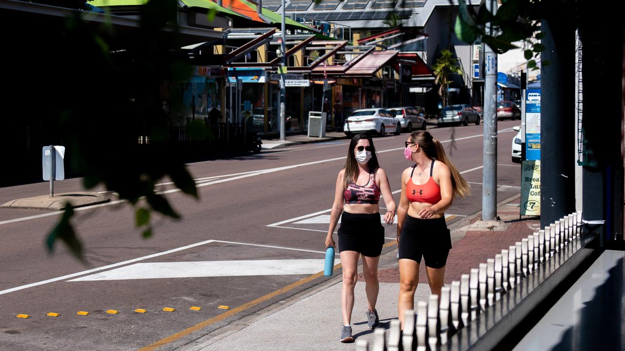 The heat of the dry season has seen the normally busy party strip of Mitchell St turn in to an outdoor gym for many on their hour of exercise per day. Picture: Che Chorley