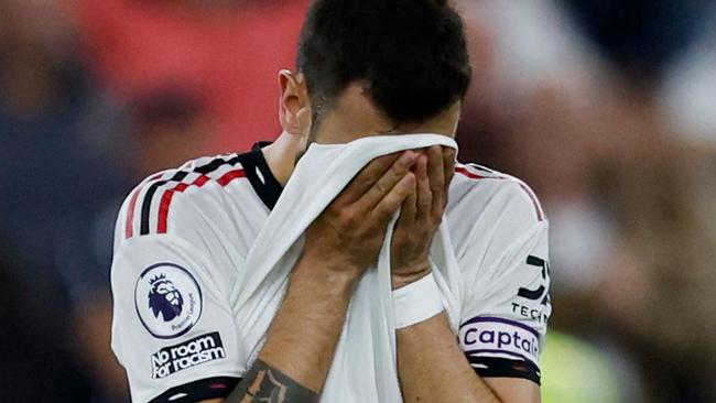 Manchester United's Portuguese midfielder Bruno Fernandes reacts at the end of the English Premier League football match between West Ham United and Manchester United at the London Stadium, in London on May 7, 2023. (Photo by Ian Kington / AFP) / RESTRICTED TO EDITORIAL USE. No use with unauthorized audio, video, data, fixture lists, club/league logos or 'live' services. Online in-match use limited to 120 images. An additional 40 images may be used in extra time. No video emulation. Social media in-match use limited to 120 images. An additional 40 images may be used in extra time. No use in betting publications, games or single club/league/player publications. /