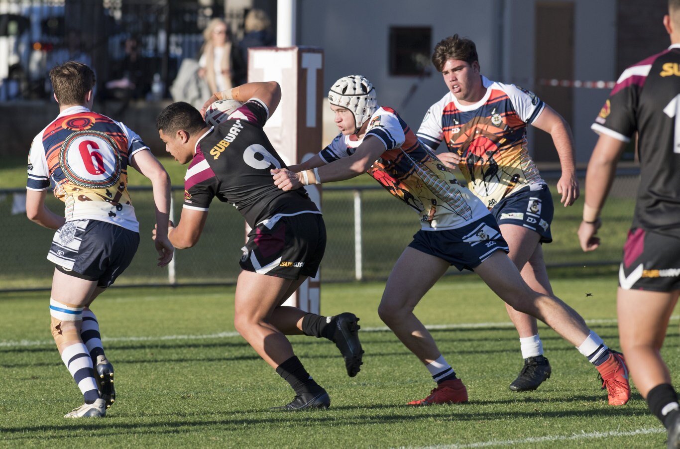 Chris Faagutu, Marsden tackled by Thomas McGahn, St Mary's.