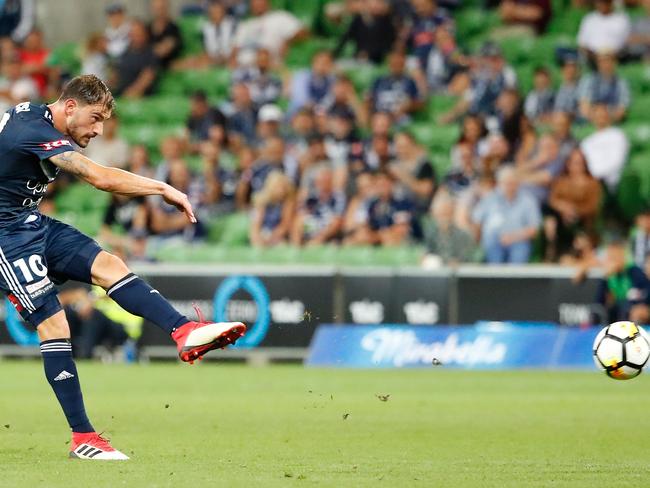 Melbourne Victory’s James Troisi unleashes a rocket against Brisbane Roar on Friday night.