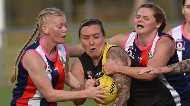 Townsville Women's AFL game between Hermit Park Tigers and Curra Swans at Murray Sporting Complex. Swans Montana Dove and Mikayla Abson and Tigers Hayley Cornish. Picture: Evan Morgan