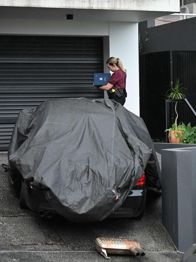 Police at the house on Monday. Pictures: Lyndon Mechielsen