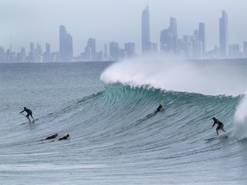 Surfers pictured enjoying good swell and near perfect waves at Snapper Rocks. Picture: Mike Batterham