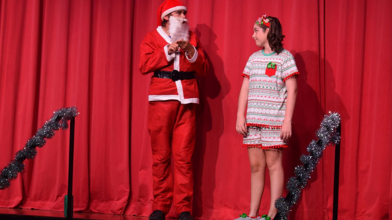 Thomas Hurley as Santa and Abbey Burton as Rosie in Rosie's Christmas Adventure.