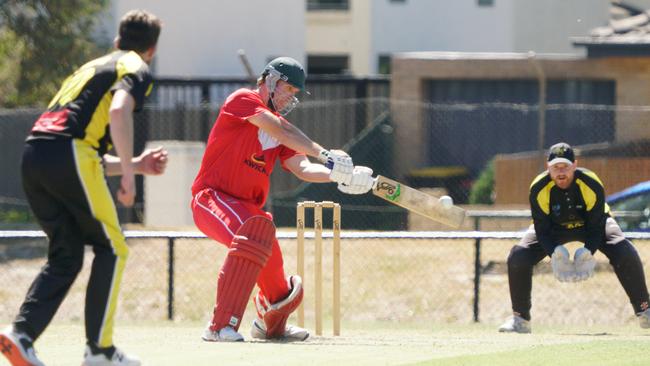 Lochlan Davies cuts a delivery from Matthew Walker. Picture: Valeriu Campan