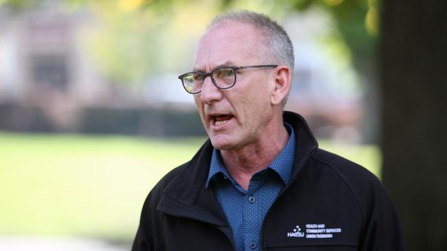 HACSU chief Tim Jacobson peaks to the media outside Parliament House in Hobart on Wednesday May 1, 2019.