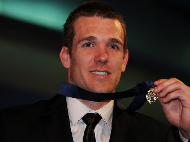 Swan after winning the Brownlow Medal in 2011.