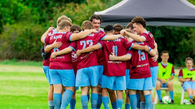 St Albans players talk tactics before a match. Picture: DSL Photography