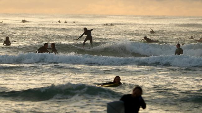 GOLD COAST, AUSTRALIA - JULY 11: Surfers paddle out in memory of Alex 'Chumpy' Pullin on July 11, 2020 in Gold Coast, Australia. Australian Winter Olympic Games Snowboarder Alex 'Chumpy' Pullin died on Wednesday 8 July in a drowning accident while spearfishing at Palm Beach on the Gold Coast, aged 32. (Photo by Chris Hyde/Getty Images)