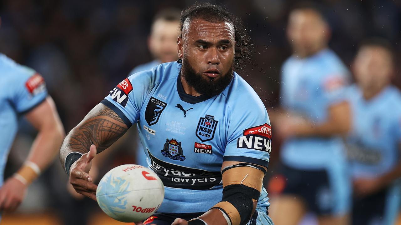 SYDNEY, AUSTRALIA - JUNE 08: Junior Paulo of the Blues passes during game one of the 2022 State of Origin series between the New South Wales Blues and the Queensland Maroons at Accor Stadium on June 08, 2022, in Sydney, Australia. (Photo by Mark Kolbe/Getty Images)