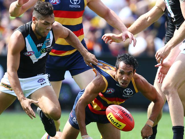 Jarman Impey literally gets hold of Eddie Betts. Picture: Sarah Reed