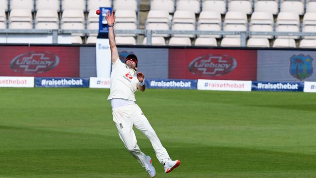 England's James Anderson just fails to reel in a catch. Picture: Mike Hewitt/POOL/AFP